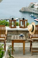 Garden furniture on terrace with harbour views 