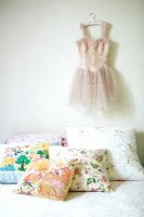 Childrens dress on bedroom wall 