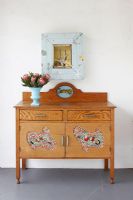 Decoratively inlaid sideboard 