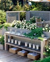Exterior shelves with candles and towels 