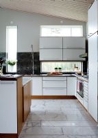 Modern kitchen with marble floor 