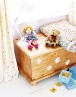 Storage chest in classic childrens bedroom 