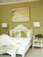 Modern bedroom with green painted walls