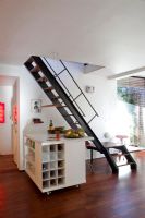 Staircase from contemporary kitchen