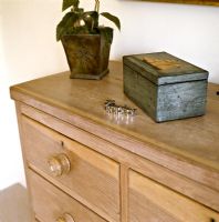 Detail of items on classic chest of drawers  