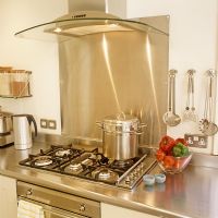 Modern stainless steel cooker and extractor fan