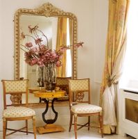 Console table and chairs in classic hallway 