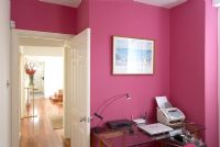 Modern study with pink walls 
