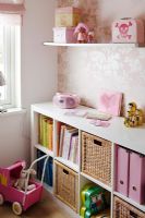 Storage boxes and shelves in childrens room 