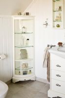 Corner shelf unit in white classic bathroom 