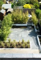 Large paved terrace of modern garden 