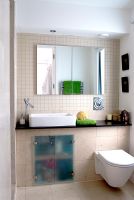 Modern bathroom with frosted glass cupboard 