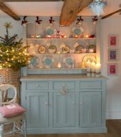 Dresser in country dining room at Christmas 