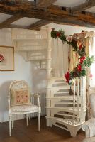 Christmas decorations on spiral staircase 
