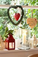 Heart shaped wreath and candles 