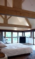 Modern country bedroom with vaulted ceiling 