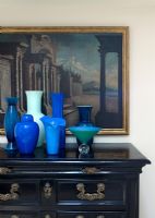 Collection of vases on classic sideboard 