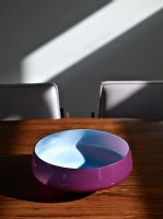Detail of modern bowl on dining table 