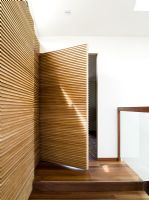 Wooden paneled wall door