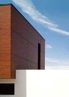 Exterior of contemporary wooden clad house 