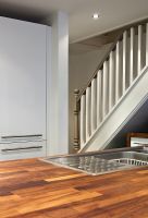 Staircase down to modern kitchen 