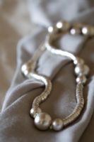 Detail of silver necklace 