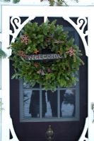Christmas wreath on country front door 