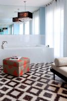 Contemporary bathroom with patterned floor 