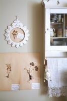 Vintage prints and wall cabinet
