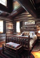 Bedroom in country log cabin 