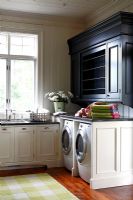Washing machine and dryer in country kitchen 