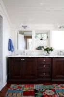 Twin sink unit in country bathroom 