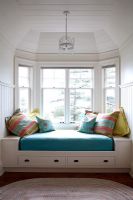 Daybed by bay window 