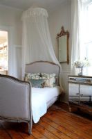 Daybed with canopy in classic bedroom 