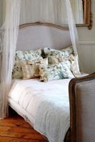 Daybed with canopy in classic bedroom 