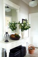 White sideboard in classic hallway 