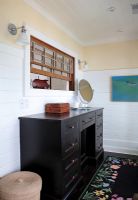 Classic chest of drawers and laundry basket 
