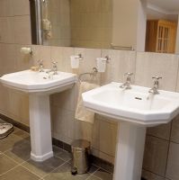 Twin sinks in modern bathroom 