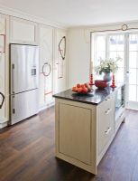 Modern kitchen with painted cupboards and walls