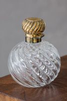 Close-up of ornate perfume bottle 