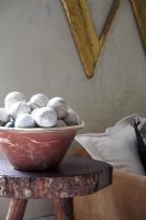 Collection of cricket balls in bowl 