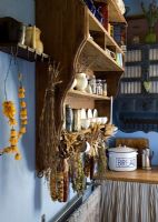Vintage wall mounted shelves in country kitchen