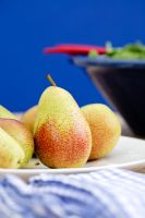 Plate of pears on kitchen table 