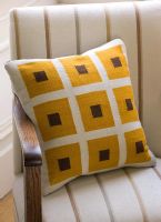 Patterned cushion on chair 