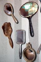 Collection of mirrors on wall