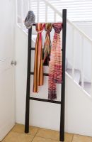 Missoni scarves displayed on ladder in hallway