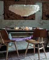 Modern dining table with retro chairs
