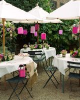Garden tables set for drinks party