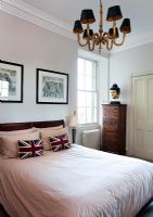 Bed with Union Jack cushions