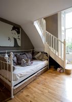 Daybed under stairs